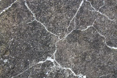 ?rack in the rock wall. Gray stone background Stock Photos