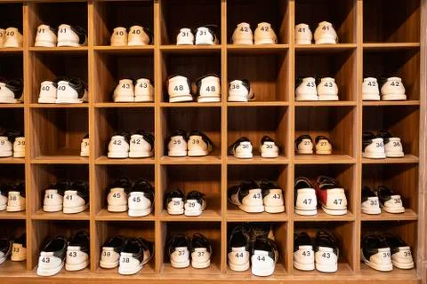 Rack with shoes Stock Photos
