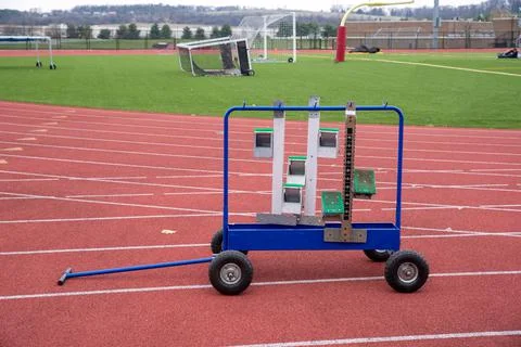 A rack of starting blocks on an athletic running race track Stock Photos