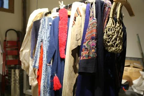 A rack of in the studio with various pieces from different styles, such as .. Stock Photos