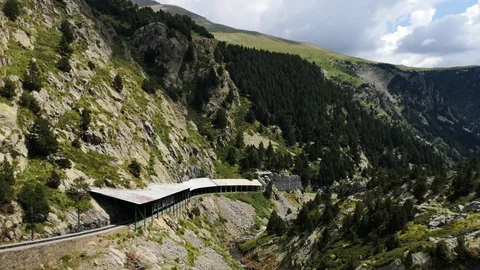 Rack train emerging from a tunnel. Video stock 94056520