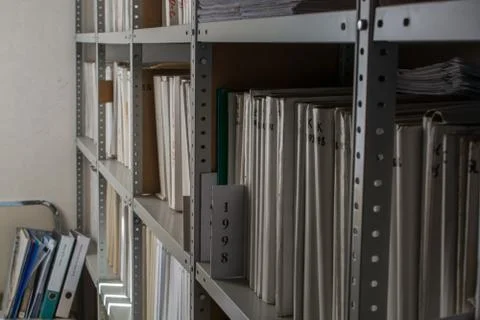 Rack witch folders in archive Stock Photos