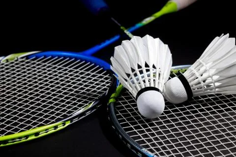 Racket and a shuttlecock. Stock Photos