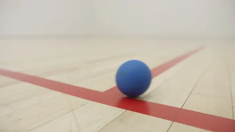 Racketball Rolling Through Frame Floor 4k Stock Footage 93664493