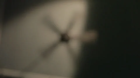 Rackfocus to ceiling fan on high Stock Footage 24632008