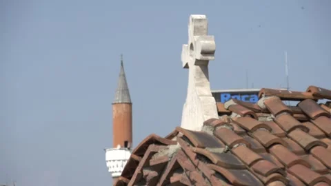 Racking focus between the Church of St. Petka Samardzhiyska and the Banya Bashi Stock Footage 334998127