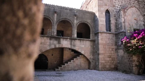 A racking focus, close up, of an old castle in the country on a sunny day Stock Footage 128597461