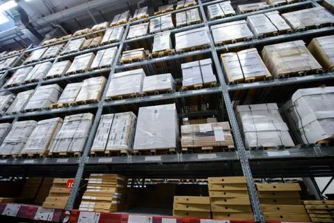 Racks with boxes are in warehouse Stock Photos