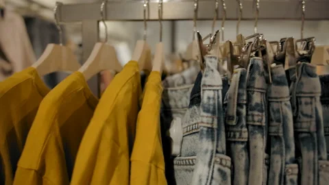 Racks with clothes in shop Stock Footage 134530049