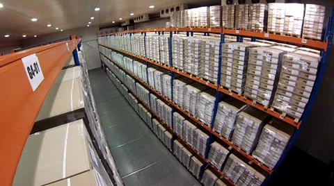 Racks in a logistics warehouse automatically slide in with merchandise on the sh 스톡 동영상 36840774