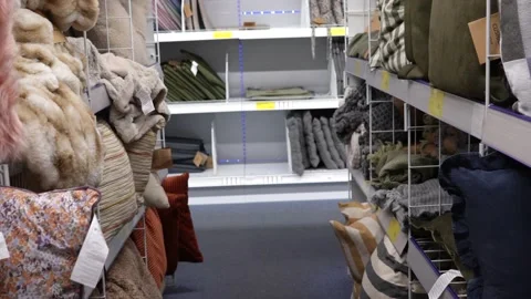 Racks with soft pillows in the store. Stock Footage 232983917