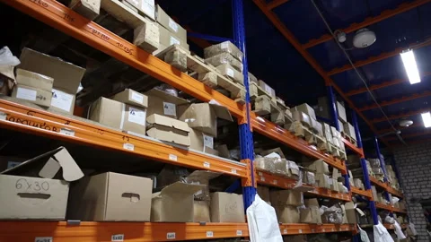 Racks in the store's warehouse Video stock 128645306