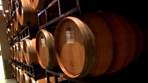Racks of wine barrels in warehouse Stock Footage 78978350