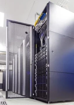 Rackserver hardware with an open door in the data center 写真素材