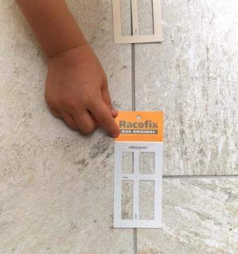 Racofix Tile Spacer Sample on Floor Stock Photos