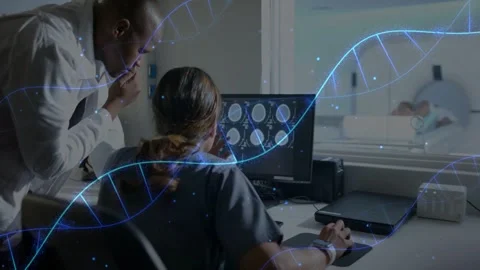 Rad tech cycling brain slices using mouse while doc leaning, assessing, DNA Stock Footage 332592194