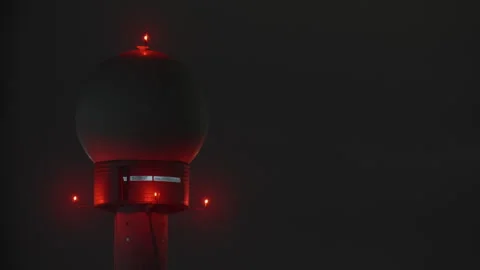 Radar dome tower with red warning lights in night fog 스톡 동영상 340476471