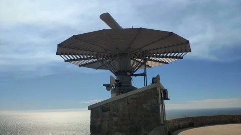 Radar for maritime traffic control at the top of the mountain with the Stock Footage 213474024
