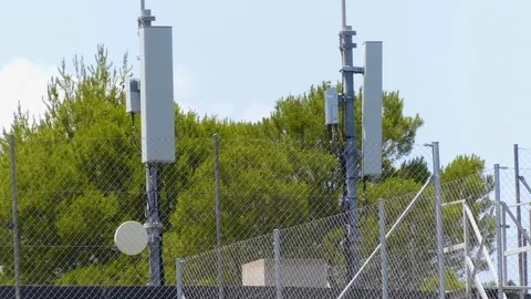 Radar Phone Technology On Posts Behind a Fence Stock Footage 124009110