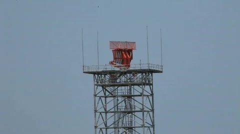 Radar spinning on the tower Stock Footage 703420