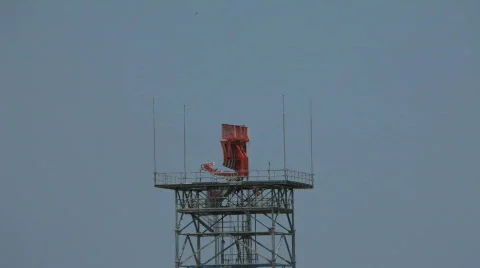 Radar spinning on the tower Stock Footage 703451
