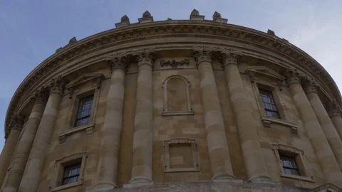 Radcliffe Camera reading library and University Church of St. Mary the Virgin, Stock Footage 82931604