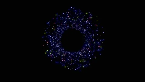Radial three-color particles that emit light. An orbit that extends from the  库存影片 167429551