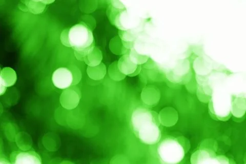 Radiant emerald bokeh effect, creating a vibrant and luminous atmosphere wi.. Stock Photos