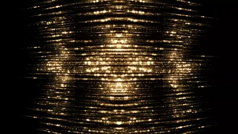 Radiant Golden Light Sphere Emerging from Shimmering Horizontal Particles Stock Footage 344750594