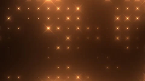 Radiant golden star pattern on a warm amber background, creating a festive .. Video stock 315666905