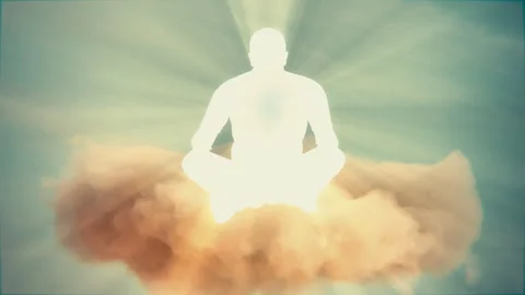 Radiant meditating figure floating on clouds in golden divine light Stock Footage 319652713