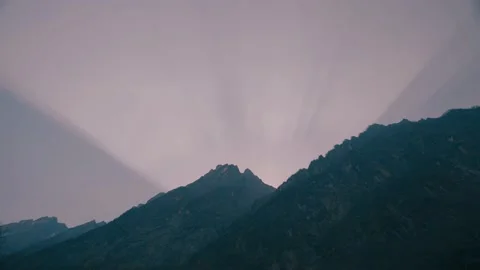 Radiant Shade of Sun Light Behind Mountain Stock Footage 154017244