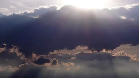Radiant sunlight shining through dramatic clouds Video stock 62969214