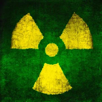 Radiation sign, yellow on green. Nuclear hazard emblem, grunge textured. Radi Stock Photos