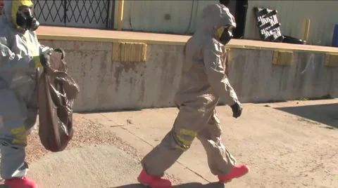 A radiation team responds to an emergency during this drill. Stock Footage 67426207