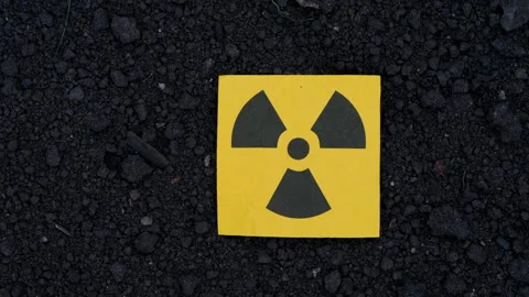 A radiation warning sign on a background of soil. Stock Footage 293227480