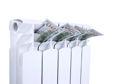 Radiator battery with dollars Stock Photos