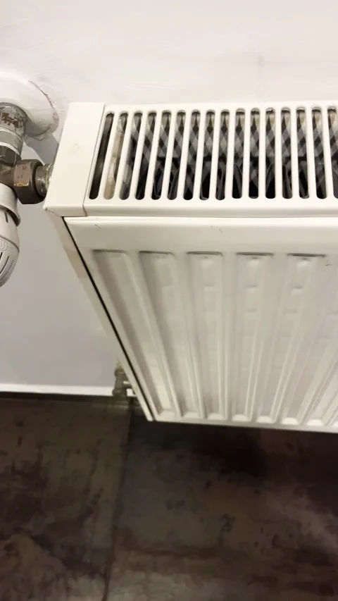 Radiator battery for heating an apartment with a temperature sensor. Stock Footage 322099050