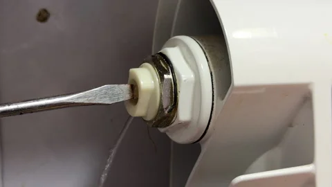 Radiator Bleeding Valve Opens to Release Hissing Air Stock Footage 329087413