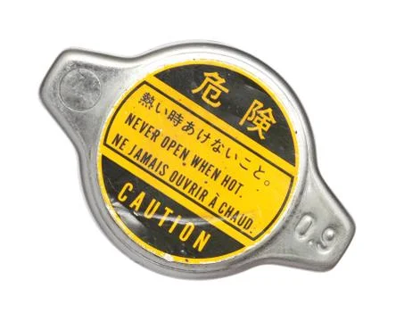 Radiator cap with warning label Stock Photos