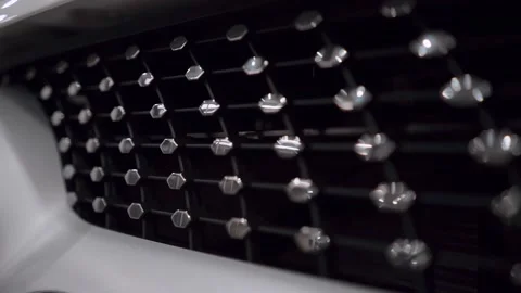 Radiator grille with chrome elements of the new car close up. Stock Footage 163053734