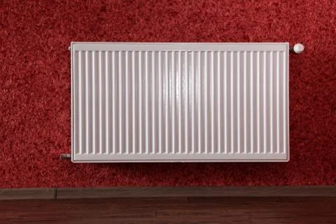 Radiator in red room Stock Photos