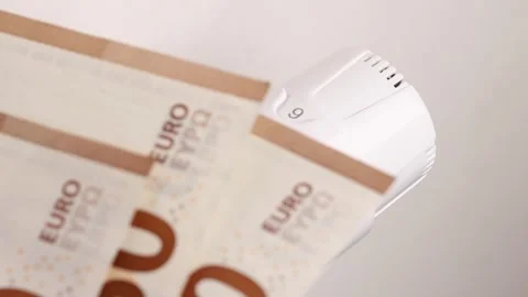 The radiator temperature is set to maximum, with euro bills placed Stock Footage 280640583