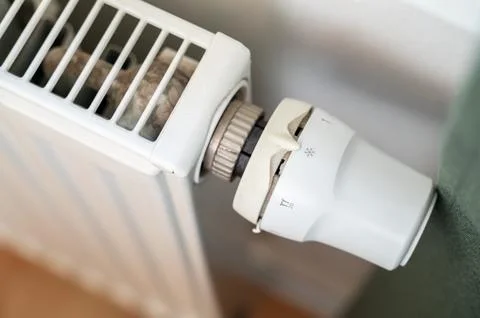 Radiator valve on minimum Stock Photos