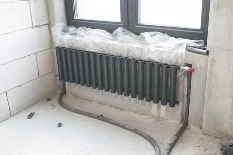 Radiators of heating system, Radiators with cylindrical tubes. Stock Photos