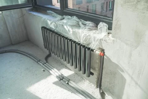 Radiators of heating system, Radiators with cylindrical tubes. Stock Photos