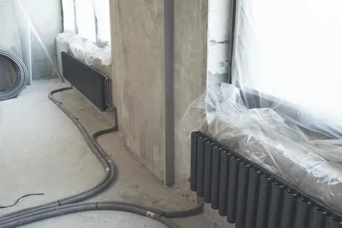 Radiators of heating system, Radiators with cylindrical tubes. Stock Photos