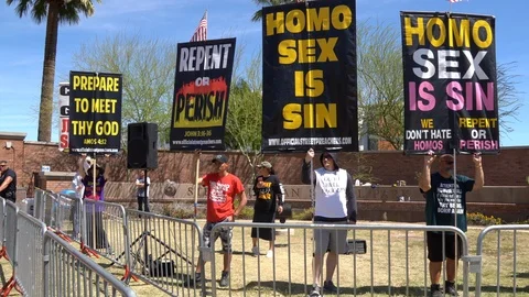 Radical bigots protesting Phoenix Pride LGBTQ Parade Stock Footage 122080909