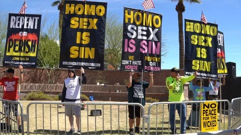 Radical bigots protesting Phoenix Pride LGBTQ Parade Stock Footage 122081370