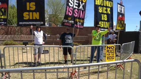 Radical bigots protesting Phoenix Pride LGBTQ Parade Stock Footage 122084035
